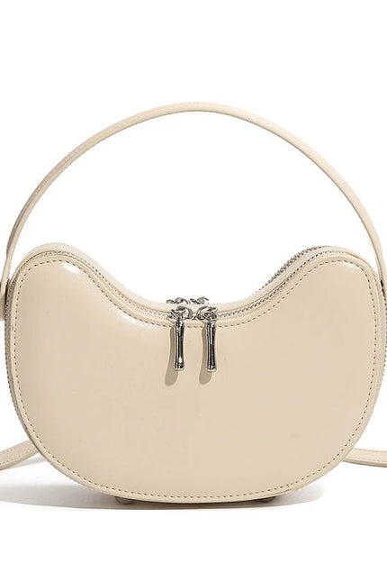 Thaléa – Leren schelptas voor vrouwen in hun krachtcyclus | Eb & Vloed Collectie