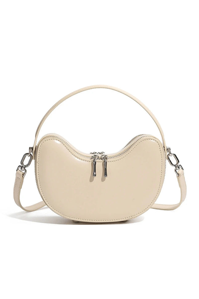 Thaléa – Leren schelptas voor vrouwen in hun krachtcyclus | Eb & Vloed Collectie